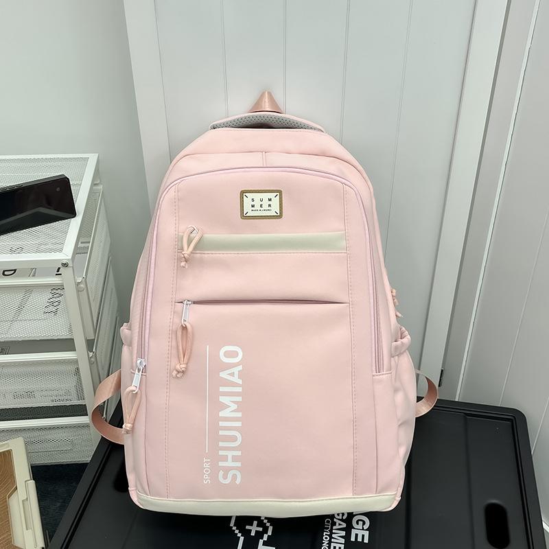 

Школьный рюкзак большой вместимости женский простой однотонный для учениц средней школы рюкзак с широкими плечевыми лямками и защитой спины модный повседневный рюкзак розовый