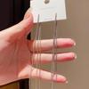 Elegant Retro-Style Snake Bone Chain Tassel Earrings for Women