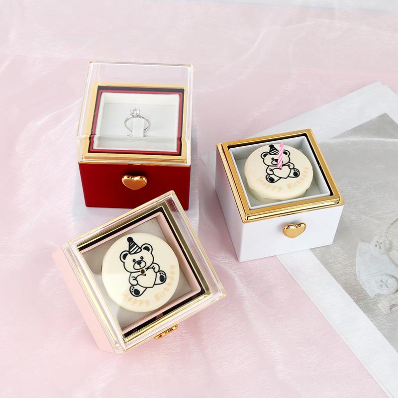 Valentine's Teddy Bear Gift Box: Rotating Cake Decoration & Jewelry Holder with Necklace, Ring, and Candle.