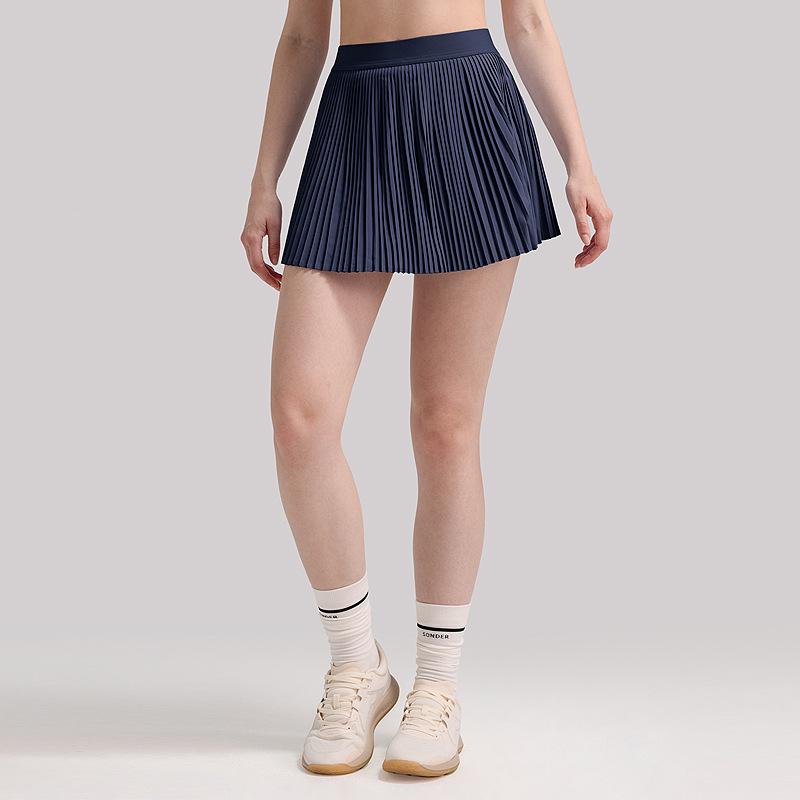 "Breezy, hip-covering athletic skirt: slimming, pleated design for outdoor fitness, tennis, and yoga."
