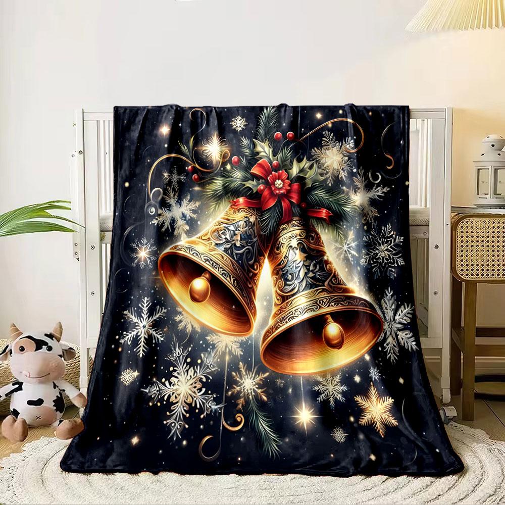 Golden bells, snowflakes, holly, and a festive red bow on a dark backdrop. for all seasons blanket lunch break throw gift 80cm x 120cm
