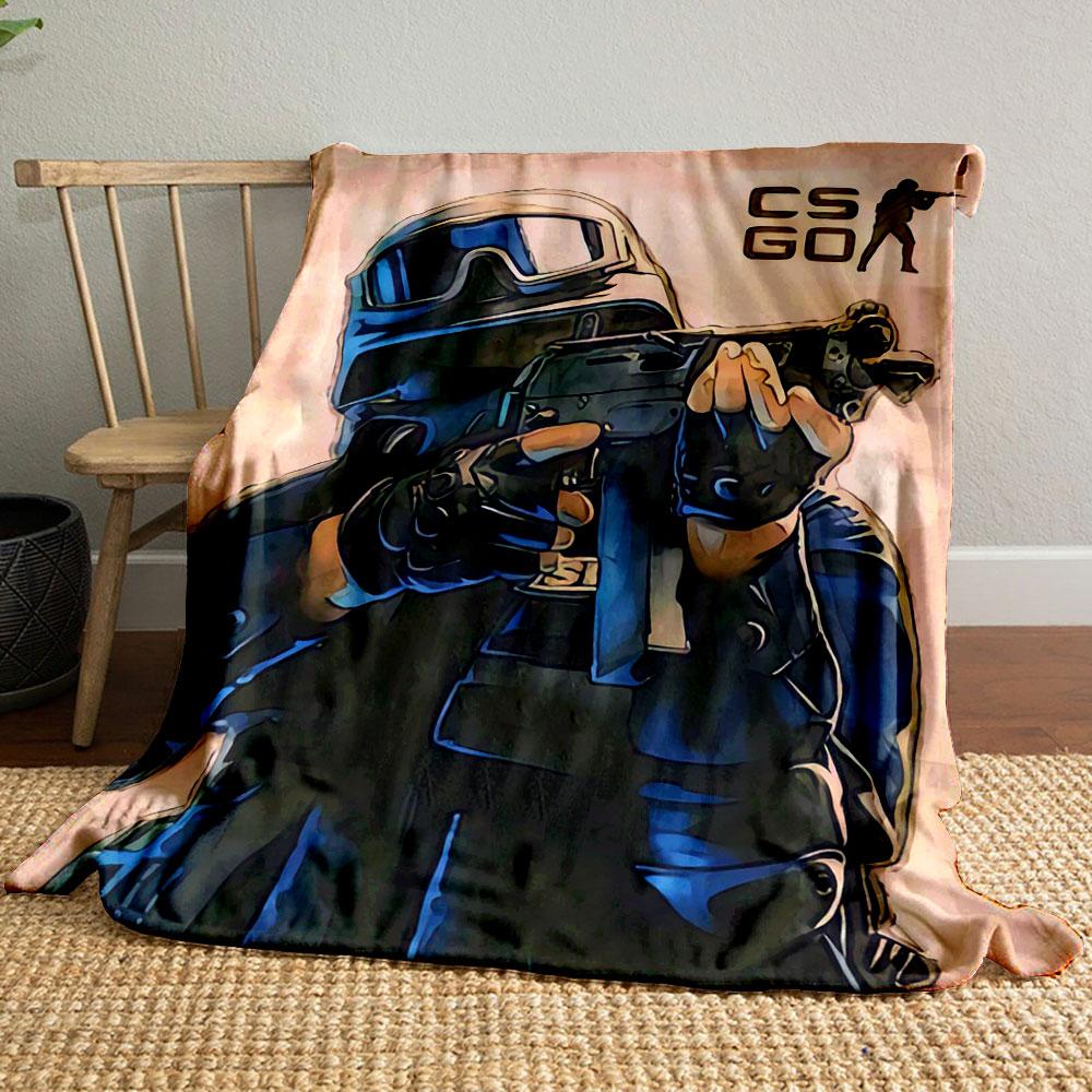 Illustration of a tactical figure aiming a weapon, with "CS GO" emblem nearby. for all seasons blanket lunch break throw gift