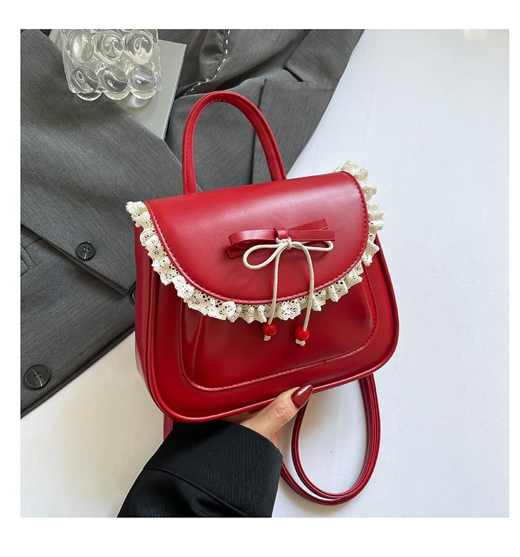 

Foreign style bow small bag women s 2025 new Korean version ins portable saddle bag shoulder messenger bag backpack красный