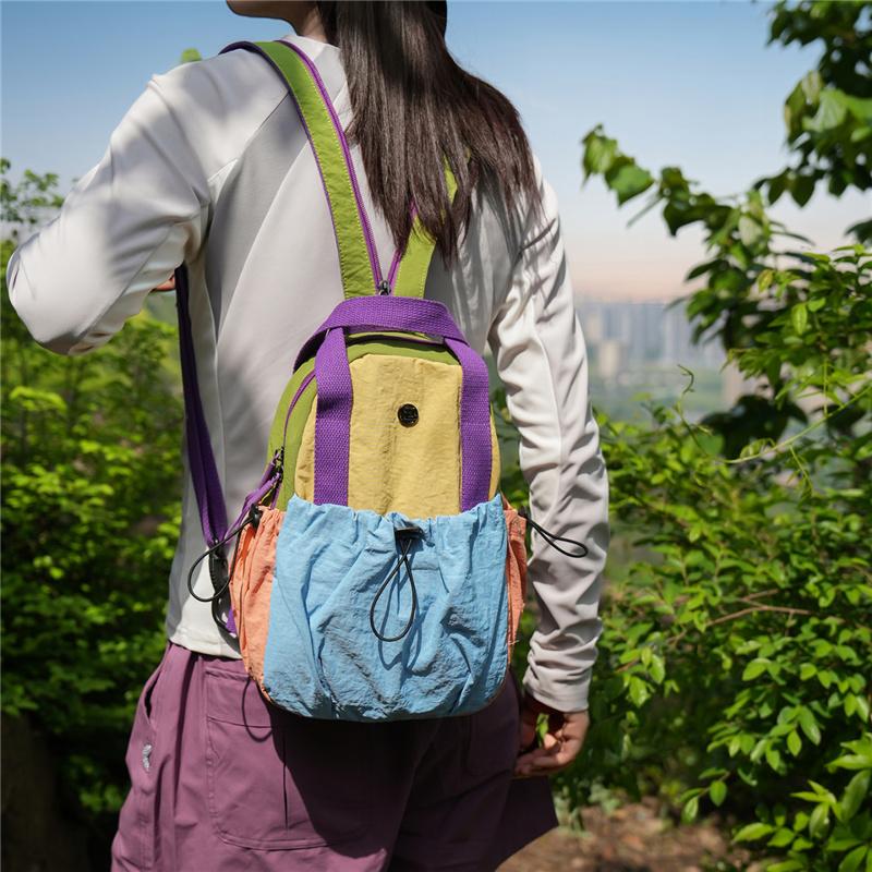 Color Block Backpack with Front Drawstring Pocket and Dual Carrying Options