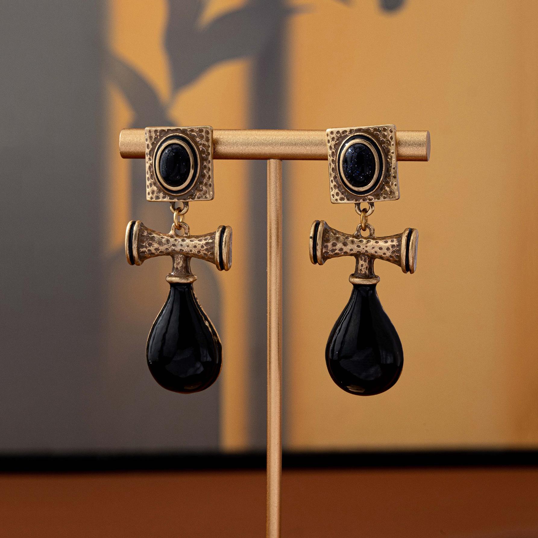 

Модные серьги-подвески для женщин золотой