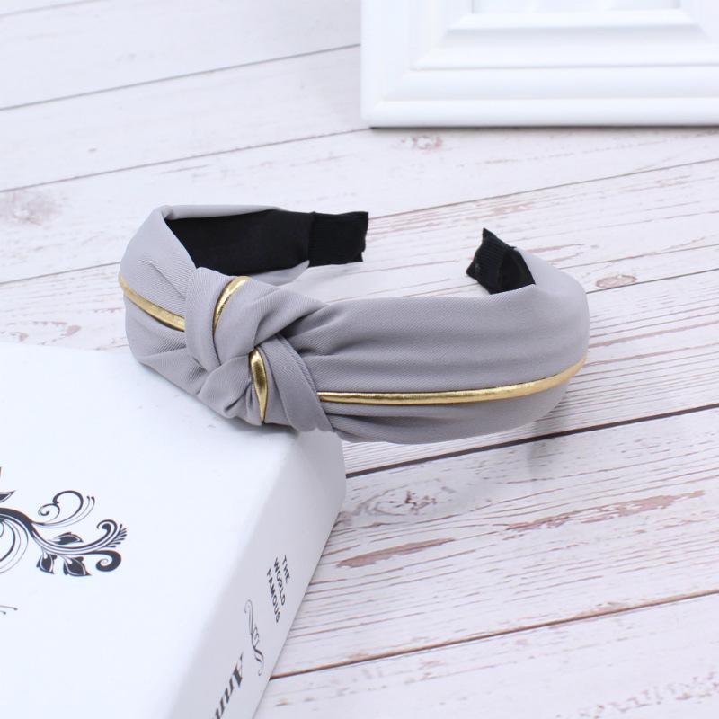 Fabric headband female Yiwu headdress jewelry autumn and winter feeling wide edge versatile high skull top headband hairpin