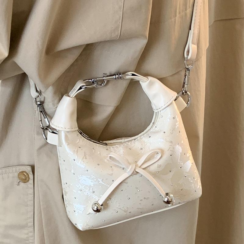 Niche high-value casual shoulder bag, new summer bow fashion portable pleated dumpling bag