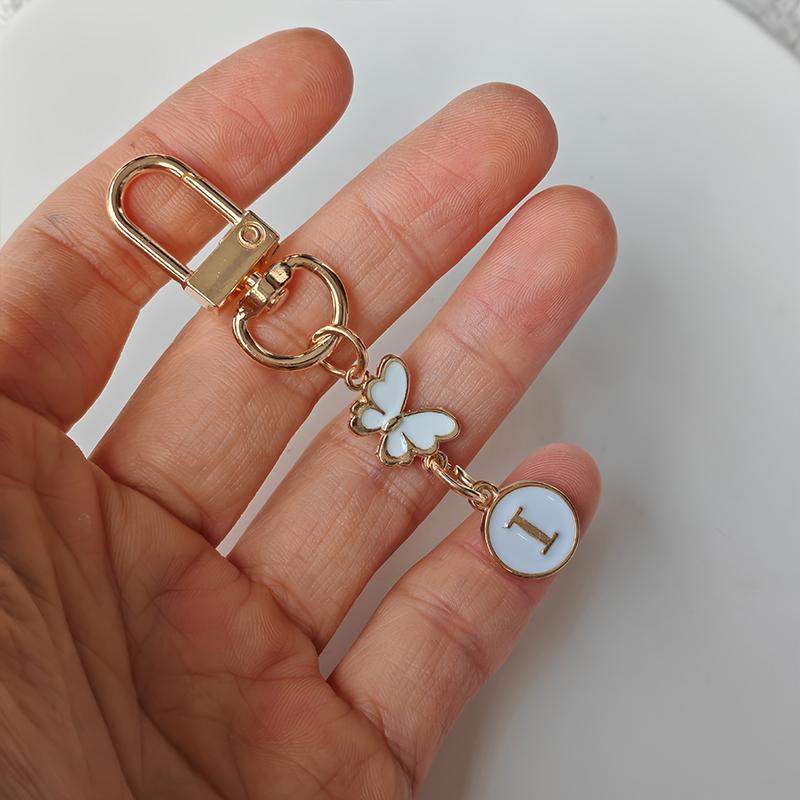 1 Stück Schlüssel-Logo Leichter Schlüsselanhänger Autoschlüssel Begleiter Taschenanhänger Langlebigkeit Metallschlüsselanhänger Monogramm-Anhänger Schmetterling Monogramm-Schlüsselanhänger