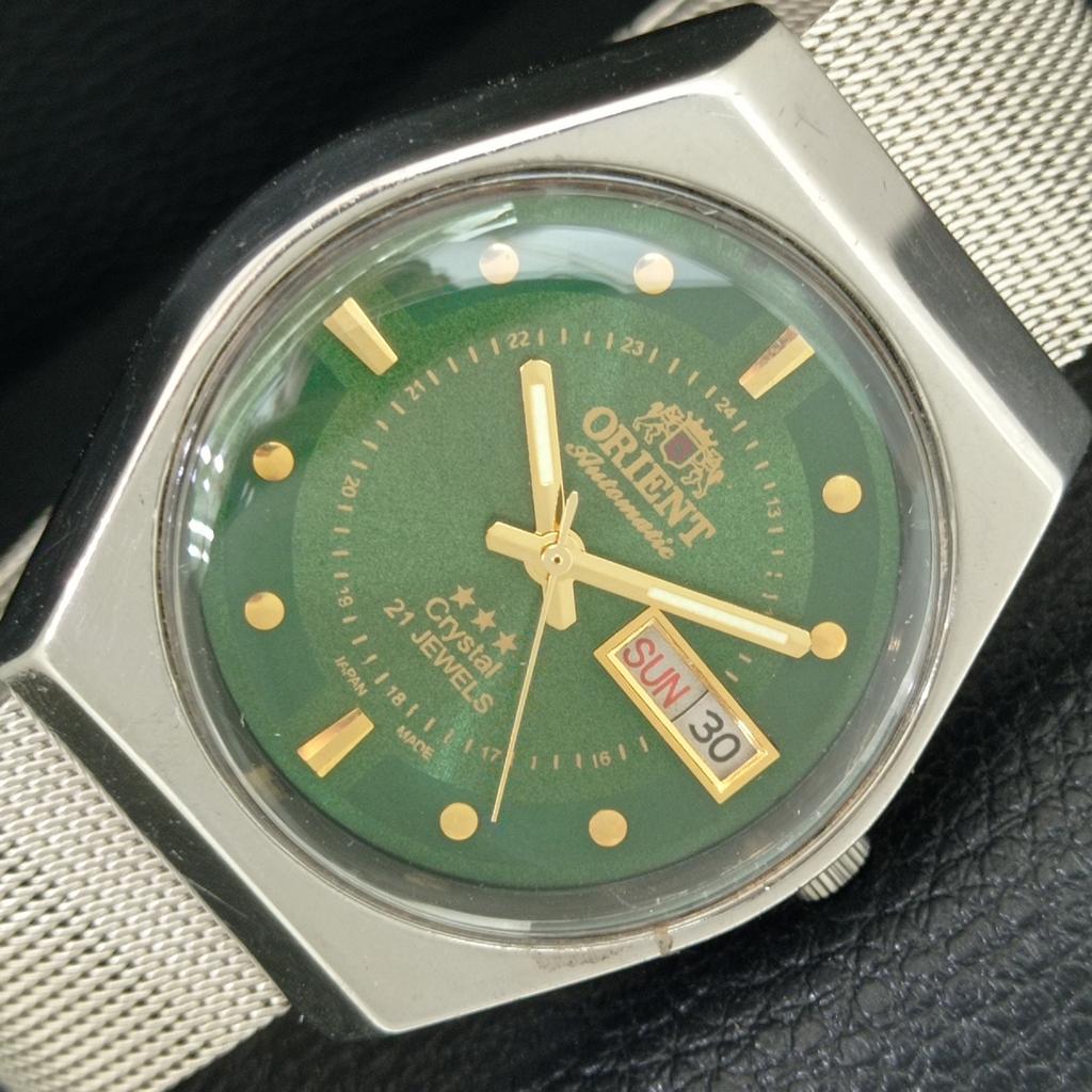 

VINTAGE ORIENT CRYSTAL AUTOMATIC JAPAN MENS GREEN COLOR DIAL WATCH a707744-1