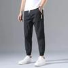 2023 Men's Korean-Style Ice Silk Casual Pants, Quick-Drying, Trendy, Loose-Fit Nine-Point Sports Pants for Summer.
