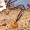 Retro chicken wing wood second generation old beeswax necklace men and women versatile amber pendant long sweater chain pendant