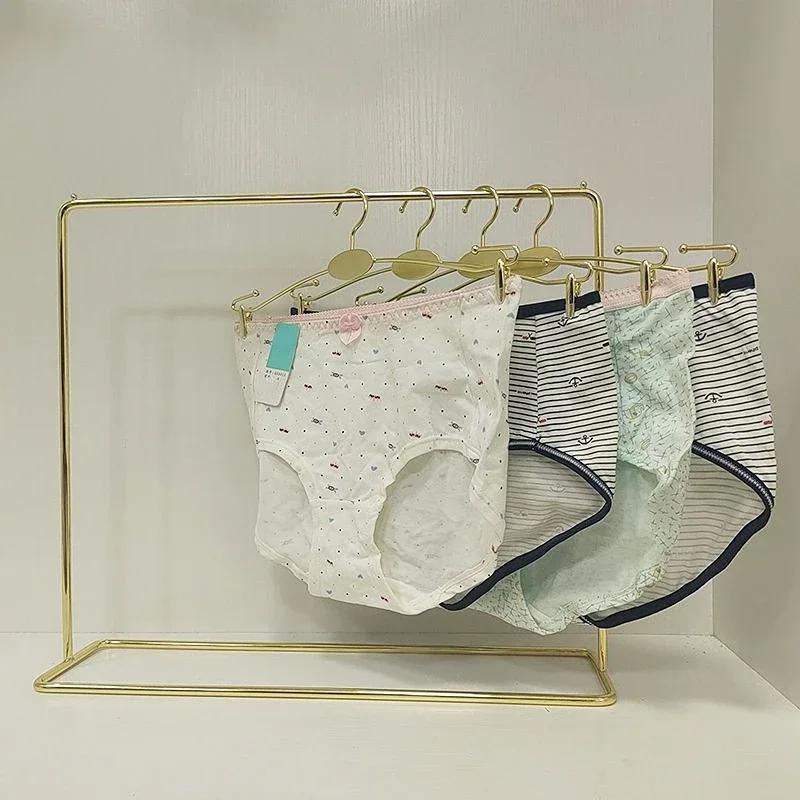 Étagère d'exposition de vitrine de magasin de vêtements moderne Cintres pour sous-vêtements Art en métal et fer Outils d'organisation Clip crochet de présentation pour culotte dame soutien-gorge