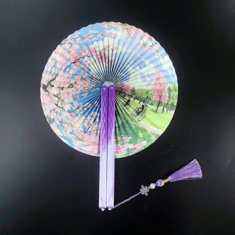 Tragbarer runder Fächer mit Quaste im chinesischen Stil - Klassisches Hanfu-Cheongsam-Accessoire für Frauen