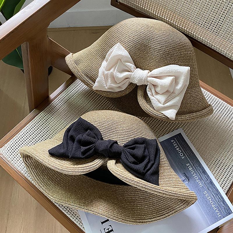 Elegant ribbon bow pearl grass hat women's summer dome seaside outing shading versatile top hat tide