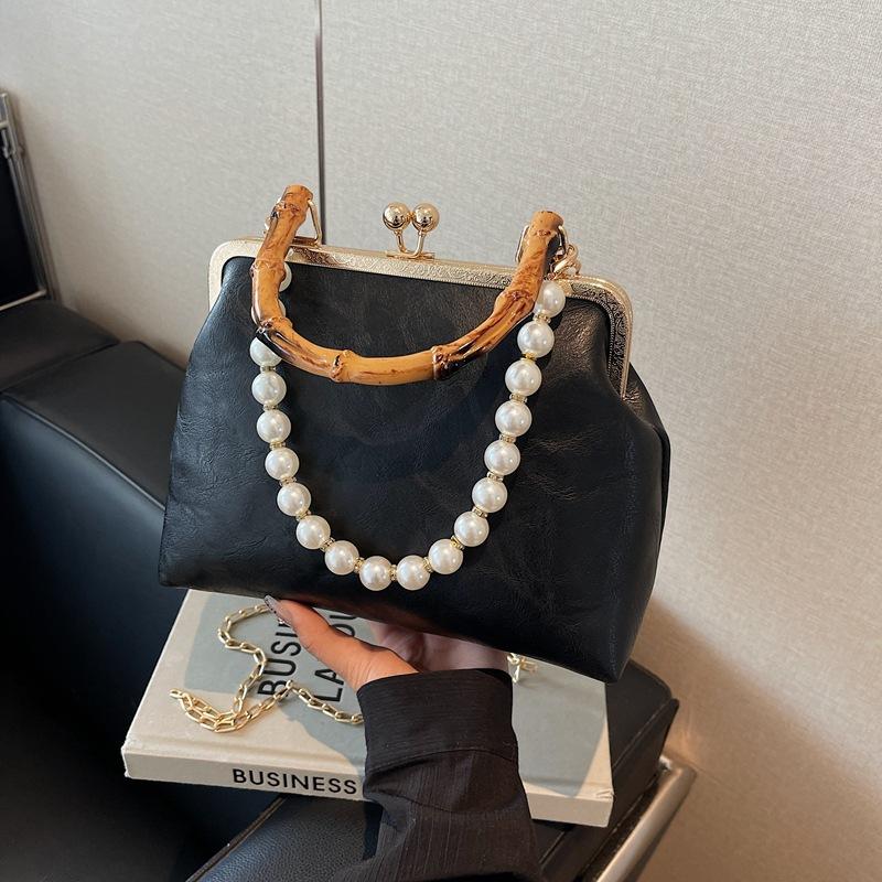 Spring and summer retro small bag women's new fashion bamboo joint portable mouth gold bag pearl chain messenger bag