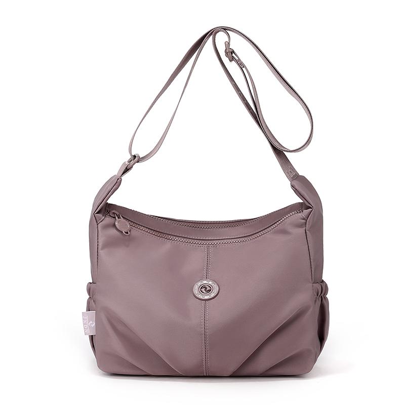 

Elegant Slouch Shoulder Bag with Top Zip Closure Adjustable Strap Geometric Stitching and Smooth Nylon Fabric for Modern Daily Wear and Commuting светло-фиолетовый