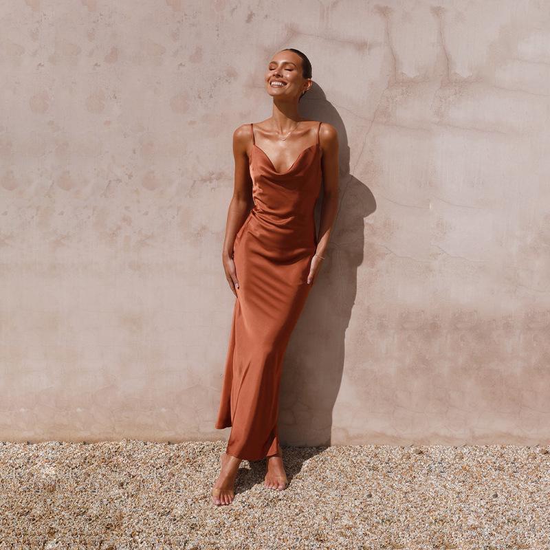 Women's Urban Fashion Solid Color Dress with Deep V-neck, Slim Fit, and Spaghetti Straps for Spring/Summer 2024.