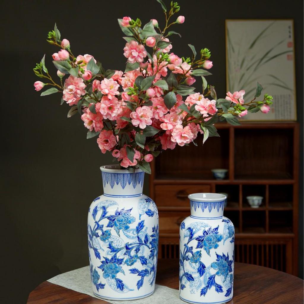 Blue & White Hand-Painted Porcelain Vase: Elegant Ceramic Ornament for Living Room or Entryway.