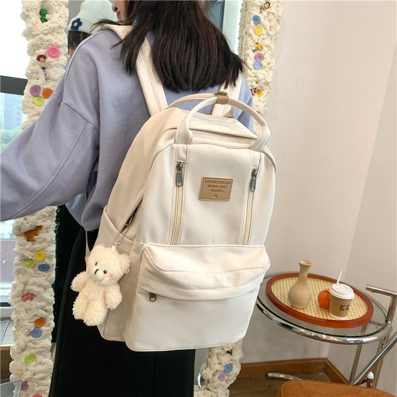 Schoolbag female Korean version ulzzang college style small fresh cute drawstring hairball soft girl student transparent backpack