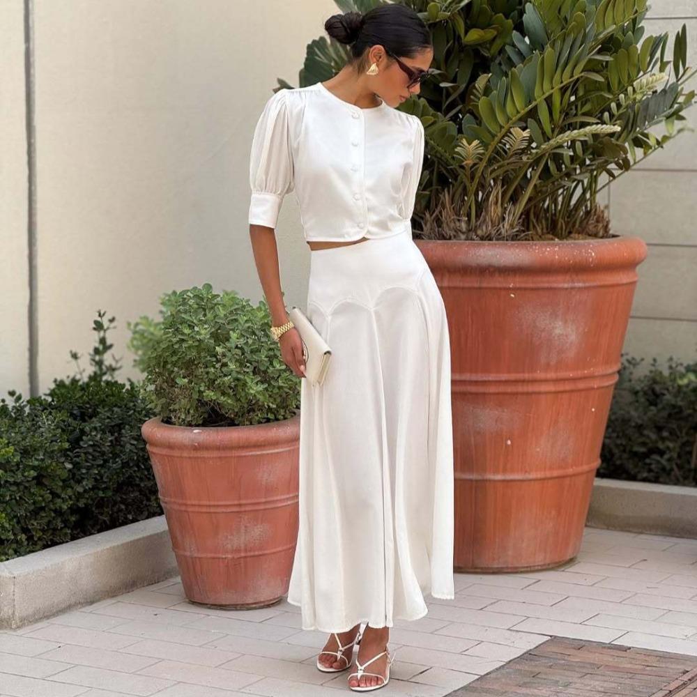 Retro Sweet Wind-pressed Pleated Solid Color Puff Sleeve Top, High-waisted Slimming Half-length Skirt, Temperament Versatile Suit