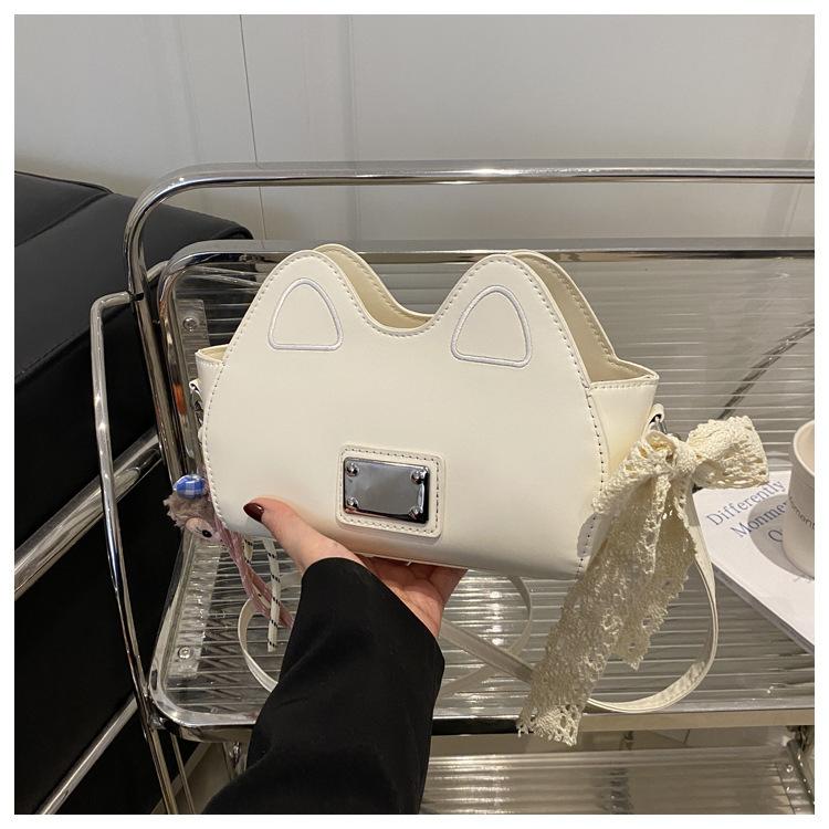 

2025 мода кэжуал личность простой большая вместимость однотонный новый тренд зарубежный стиль для поездок на работу плечевая сумка мессенджер женская Without pendant белый