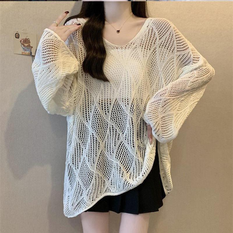 Rhombus lazy V-neck hollow long-sleeved knitted sweater women's spring and summer hem irregular sunscreen blouse knitted top