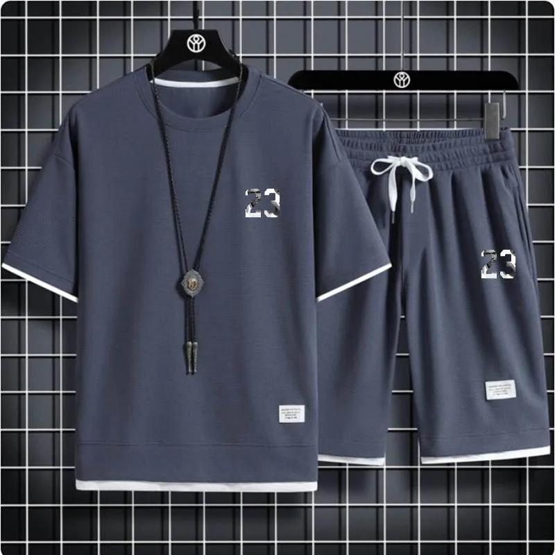 

Мужской летний спортивный комплект из двух предметов с вафельным узором, с шортами и футболкой с коротким рукавом 3XL белый/темно-синий