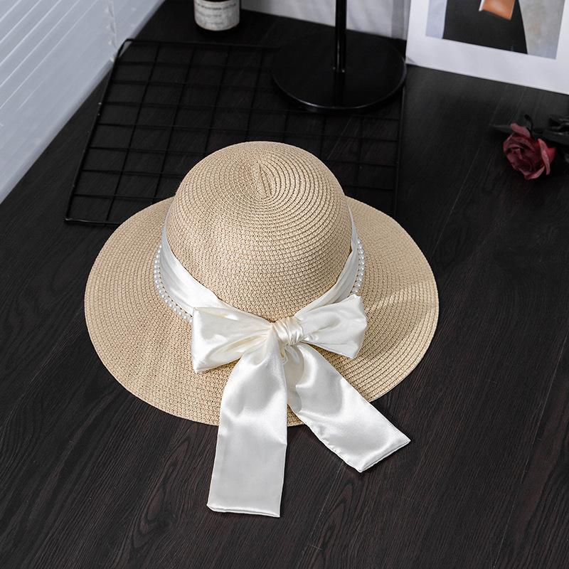 Elegant Women's Sun Hat with Bow & Faux Pearl Accents - Breathable, Wide Brim Straw Bucket Cap for Summer