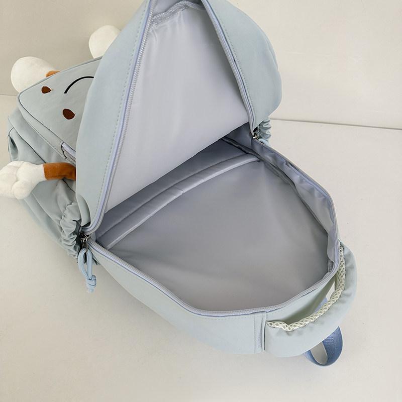 Schoolbag1011 new Korean version of female versatile primary school students 1-1 grades light spine protection campus junior high school students