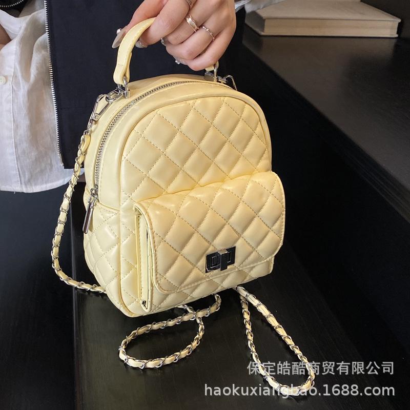 

Rhombus chain backpack women s fashion niche design high value Korean version schoolbag high sense mini travel backpack серебряный