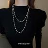 Artificial pearl beaded stacked necklace women's French retro autumn and winter sweater chain light luxury high-end dignified jewelry