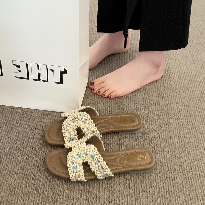 Super beautiful flat-bottomed cool slippers for women to wear 2025 summer new fairy style with skirt half-drag seaside beach sandals