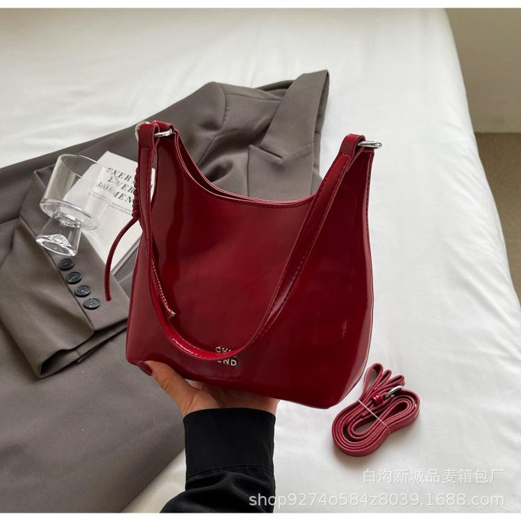 

This year s popular bag women s fashion 2025 new niche design messenger bag design sense portable bucket bag бордовый