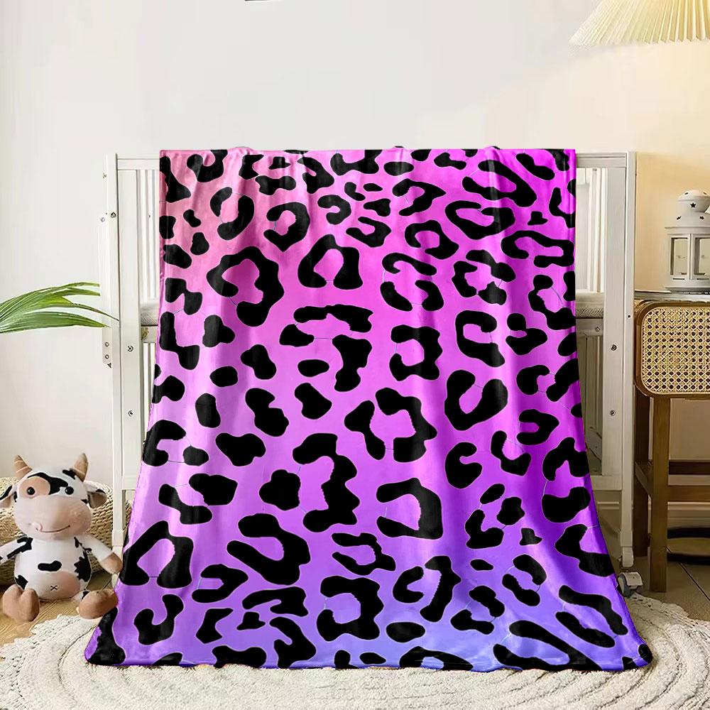 Leopard print pattern on a pink and purple gradient background. for all seasons blanket lunch break throw gift 80cm x 120cm
