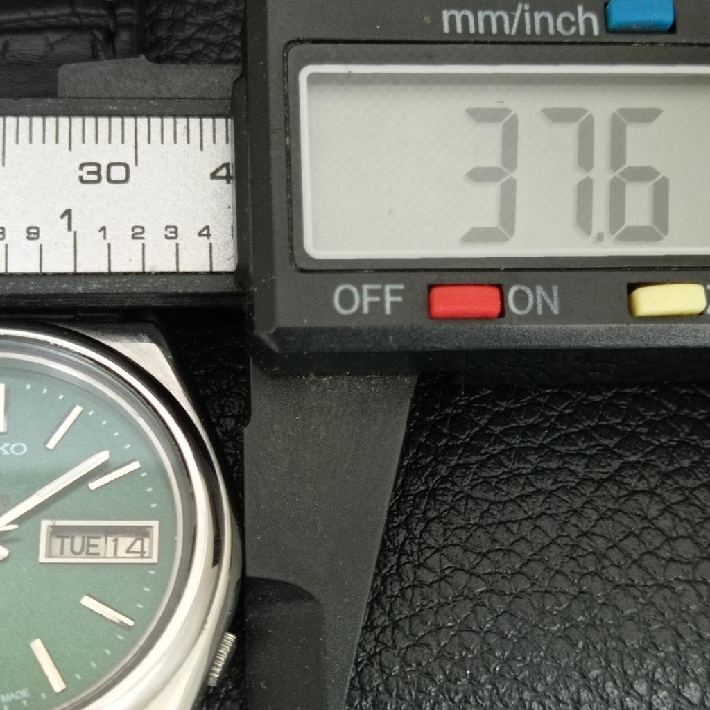 VINTAGE SEIKO EXPO 70 AUTOMATIC 7009A JAPAN MENS GREEN DIAL WATCH A708707-1