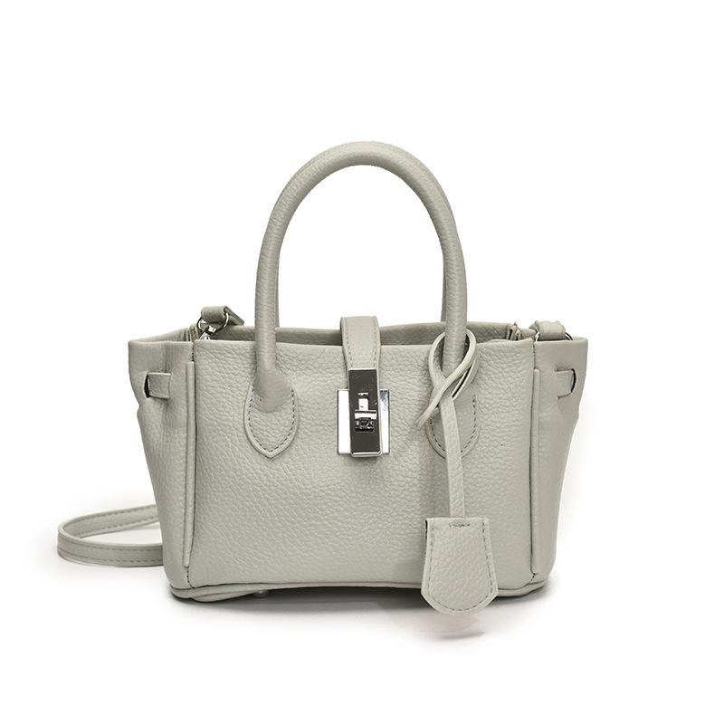 

Популярный в этом году простой стиль, ощущение высокого класса, корейская версия, портативная сумка-ведро, модный темперамент, универсальная сумка-мессенджер для поездок на работу, сумка синий