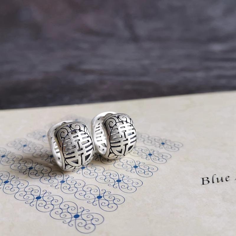 Hollow Double Happiness Circle Earrings: Retro Fashion Style for Women. Needle Back, Versatile & Individualistic Design.