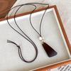 Chinese Vintage Charm: Brown Wooden Pendant Necklace for Women – High-End, Niche Clavicle Chain, Long Summer Style