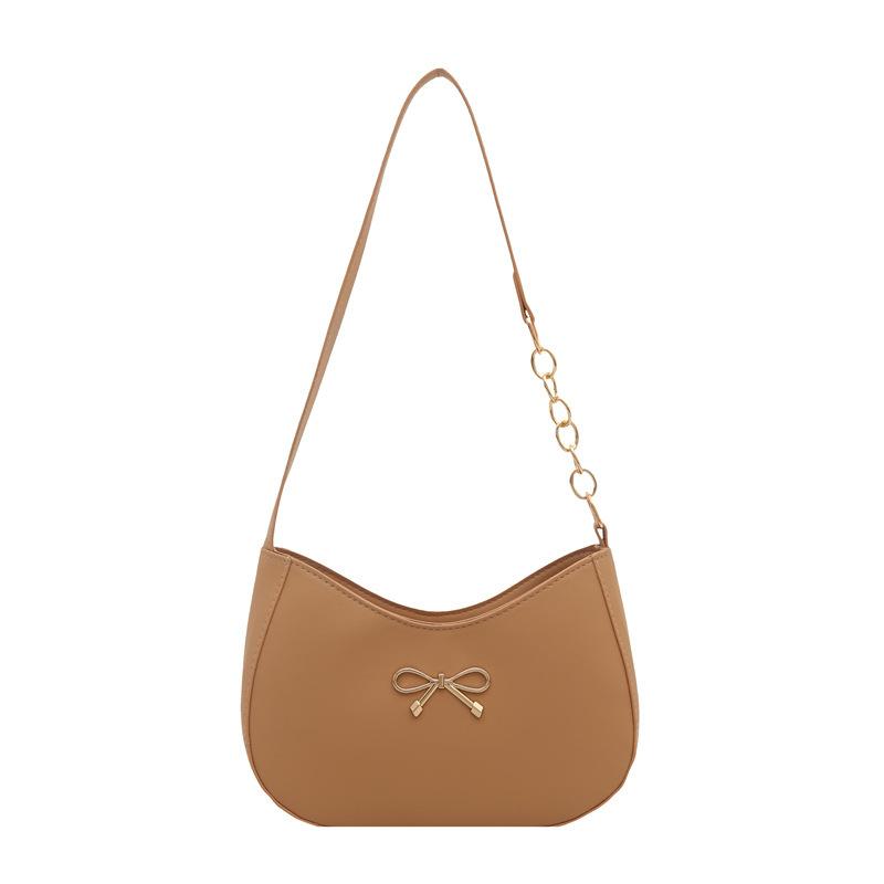 

2025 лето новый модный тренд высокая ценность повседневный универсальный городской пригородный одноплечевой бант женская сумка подмышку хаки