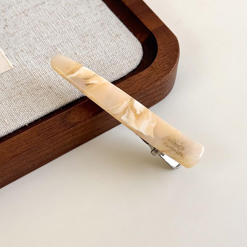 Eine Nische Retro High-End Acetat Wassertropfen Haarspange Pony Seitenclip Einreihige Entenschnabelspange High-End Leichter Luxus Haarclip für Frauen