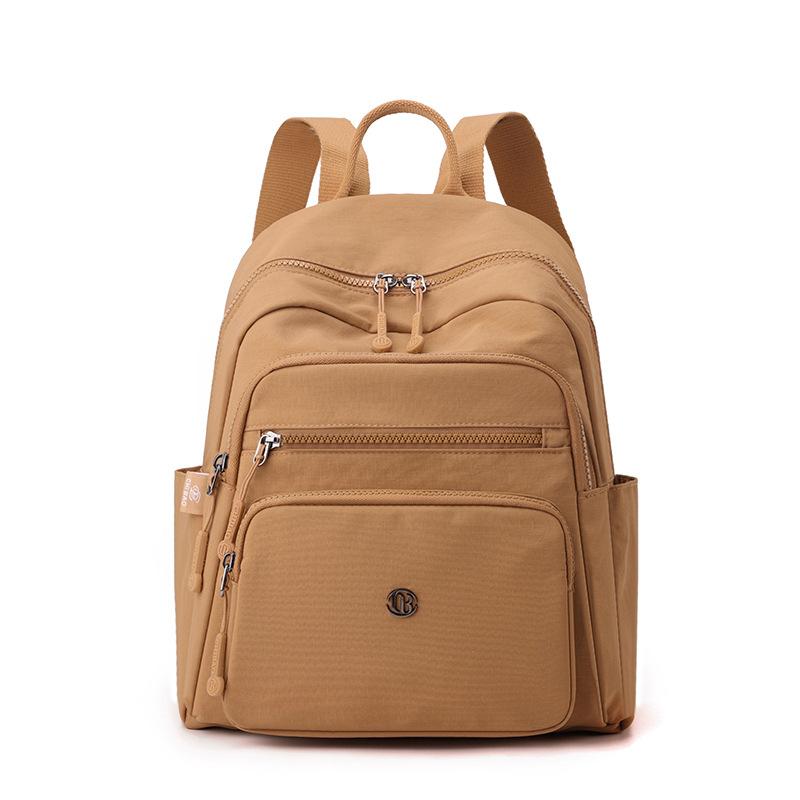 

Multi-layer storage women s backpack simple casual versatile student schoolbag large capacity outdoor commuter travel backpack One Size