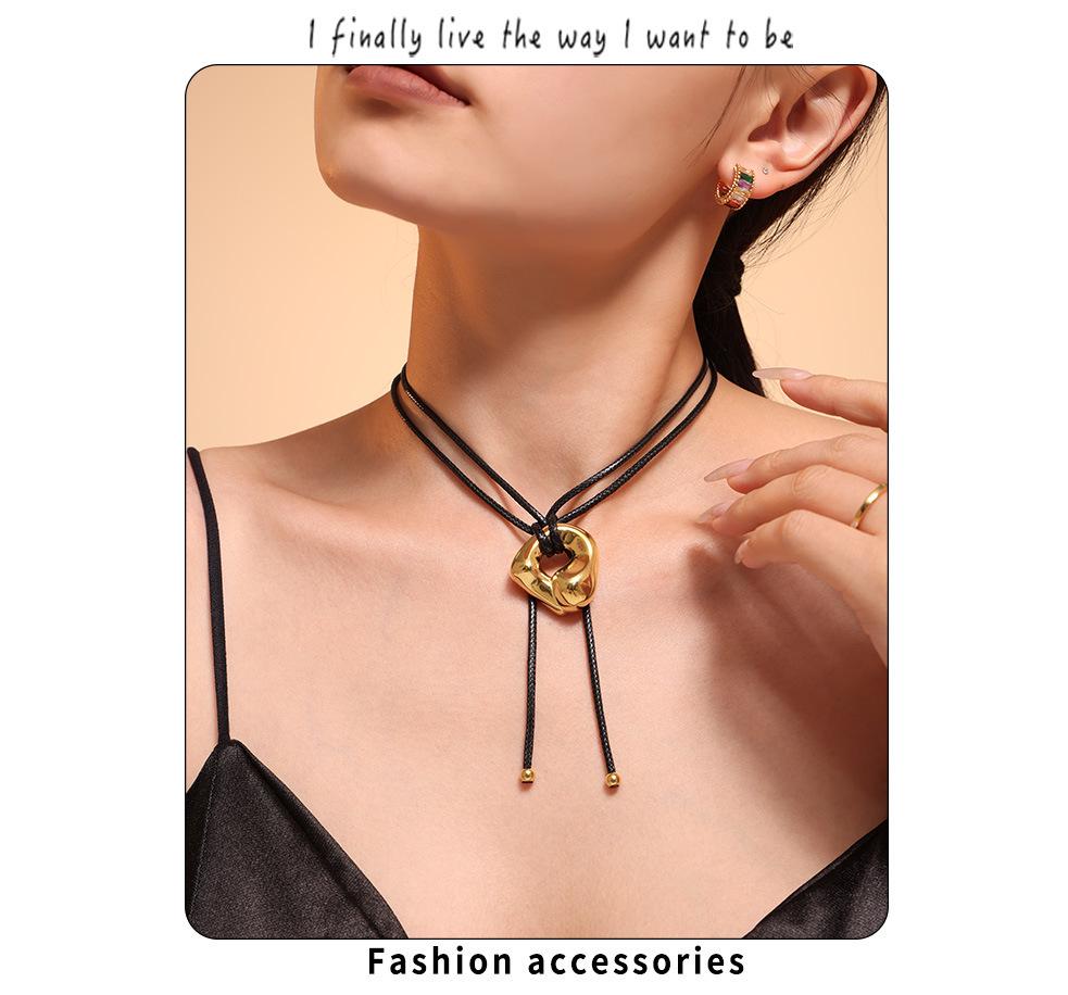 Qiong Yao Stainless Steel Curved Pendant Necklace with Black Leather Cord, Adjustable Length, Simple High-End Design for Women.