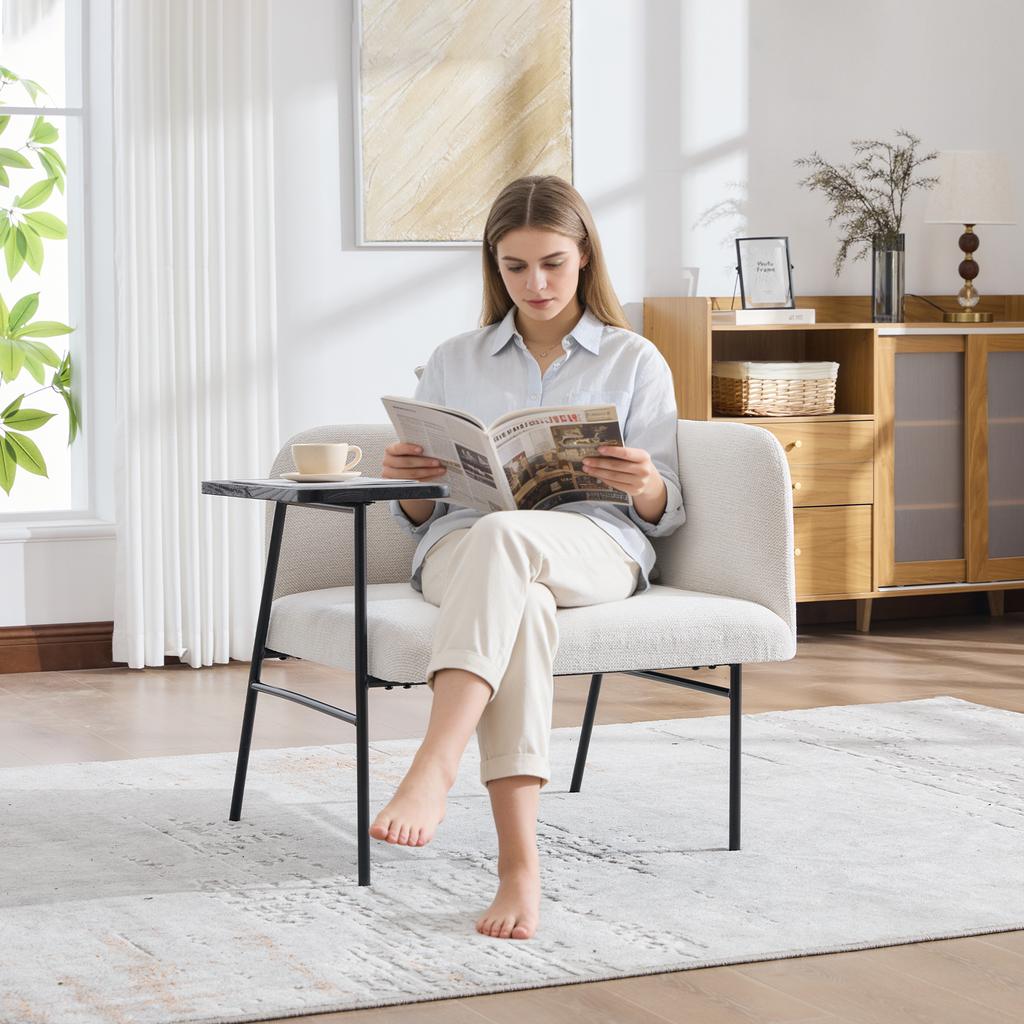 Poltrona individual moderna com encosto de tecido confortável e dois compartimentos de arrumação, complementada por uma mesa lateral prática.