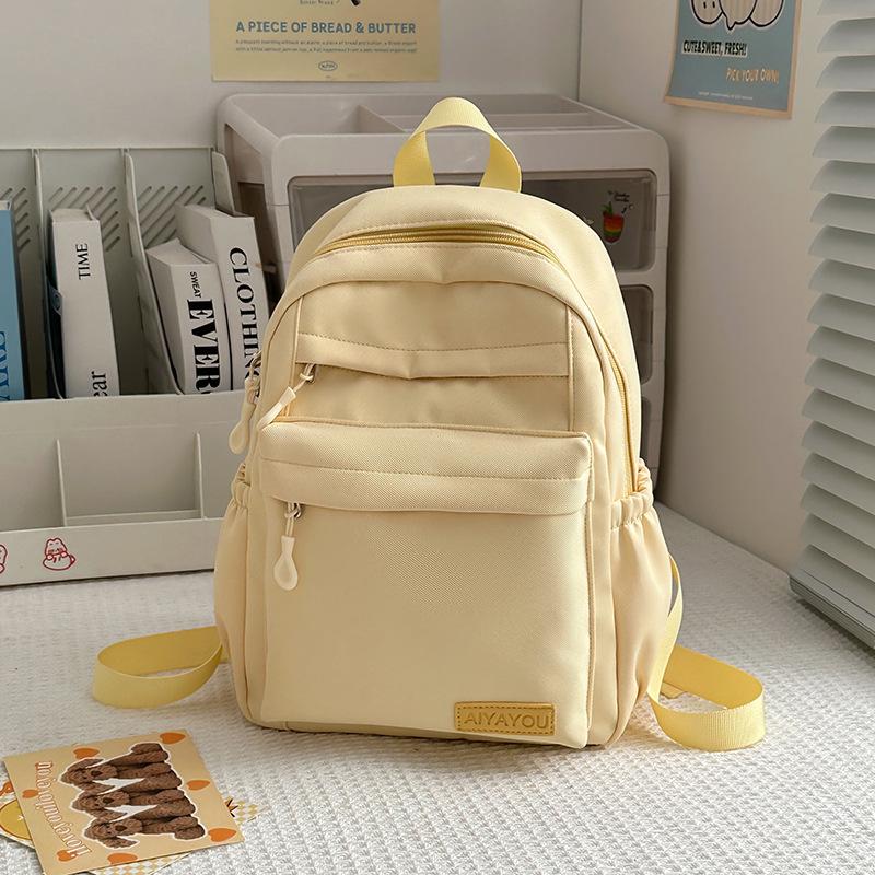 Leisure campus solid color high school student schoolbag new small fresh nylon travel backpack outside