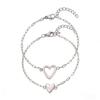 Simple and non-fading titanium steel hollow pull love  couple advanced sense two-piece set casual versatile 