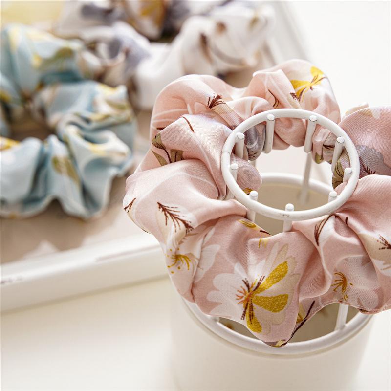 French-style smooth satin scrunchie with floral pattern, versatile elastic hair tie for women, popular on Instagram