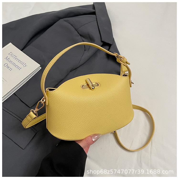 2025 new solid color temperament handbag large-capacity women's bag niche casual one-shoulder real high-end messenger bag
