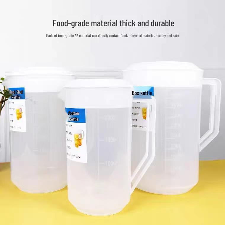 Heat-Resistant Graduated Water Pitcher: Large Capacity Plastic Kettle for Tea Brewing and Measuring.