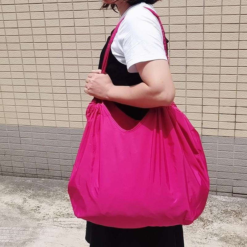 Eco-Friendly Foldable Shopping Tote with Buckle, Drawstring Closure, and Single Shoulder Strap