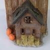 Halloween Light-Up House Ornament, Resin Building with White Figures and Gourd Motifs for Seasonal Display Scenes